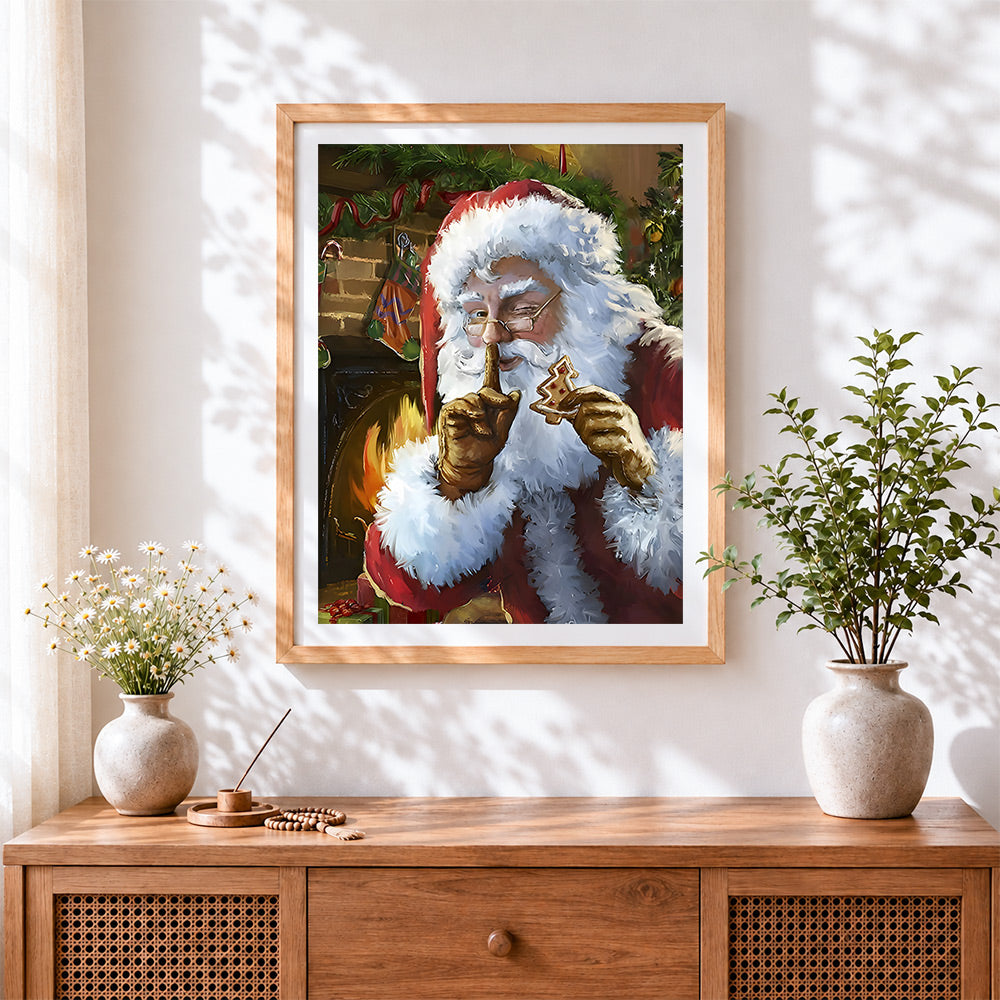 Finished father christmas eating a gingerbread man cross stitch artwork displayed