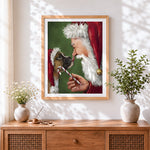 Finished father christmas giving a dog a candy cane cross stitch artwork displayed