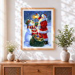 Finished father christmas giving a gift to a snowman cross stitch artwork displayed