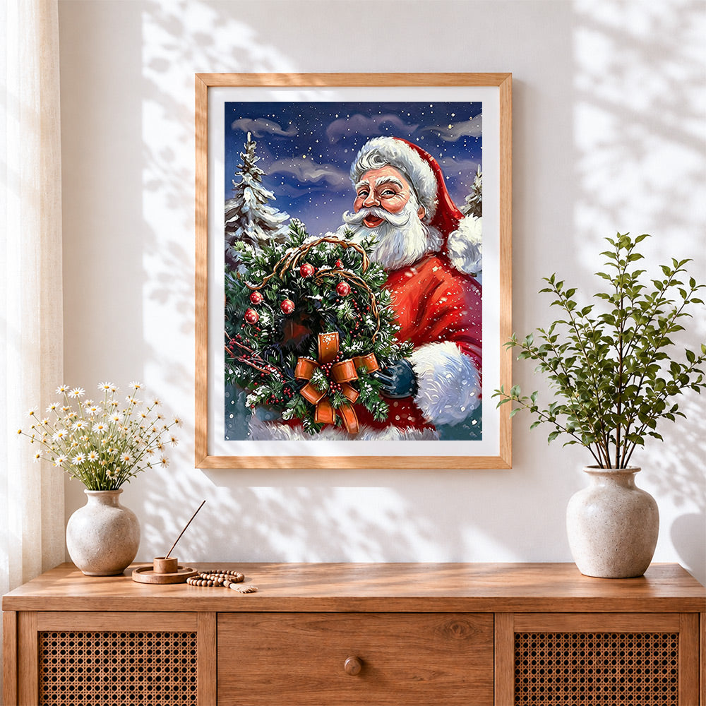 Finished father christmas holding a festive wreath cross stitch artwork displayed