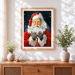 Finished father christmas holding a handful of snow cross stitch artwork displayed
