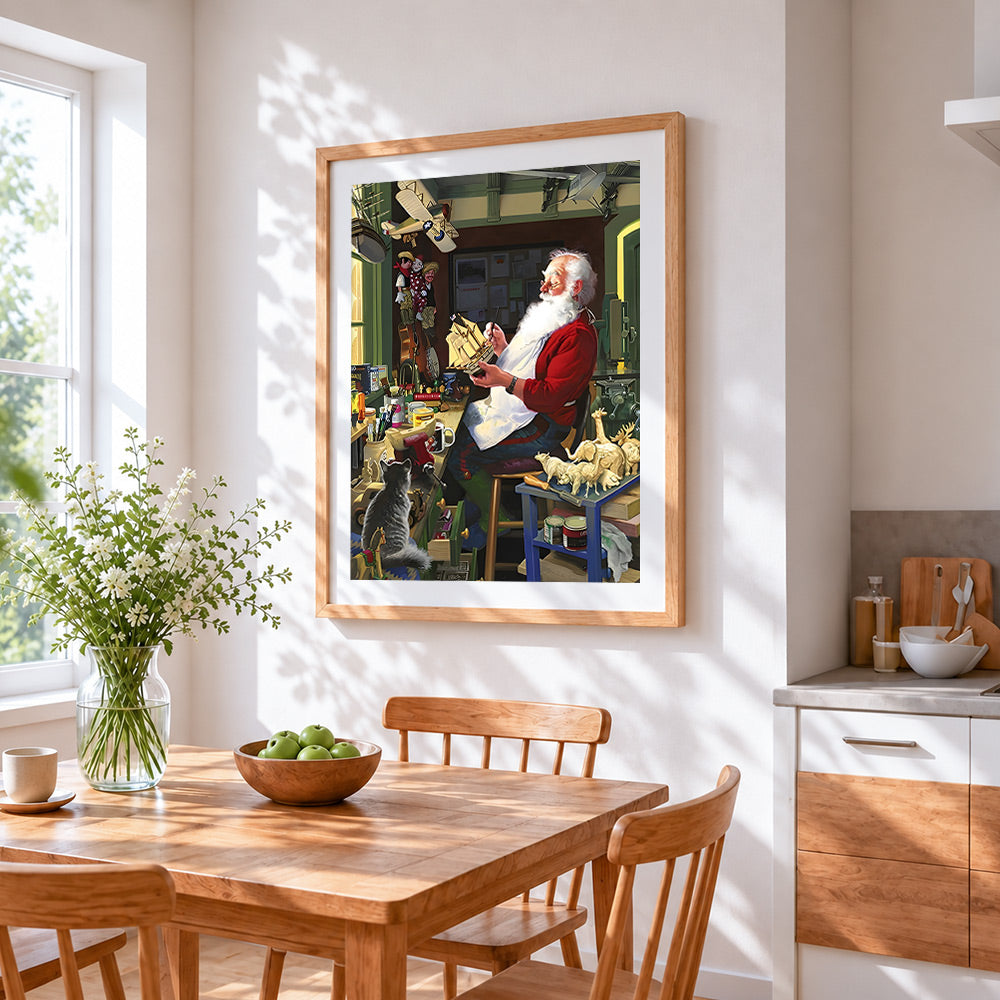Father christmas making toys cross stitch artwork displayed on wall as home decor