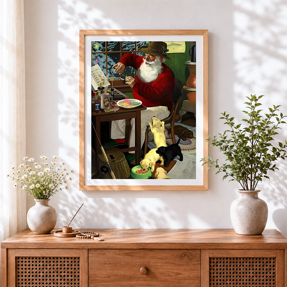 Finished father christmas making toys with puppies cross stitch artwork displayed