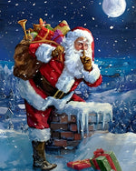 Father christmas on a snowy roof cross stitch kit for beginners
