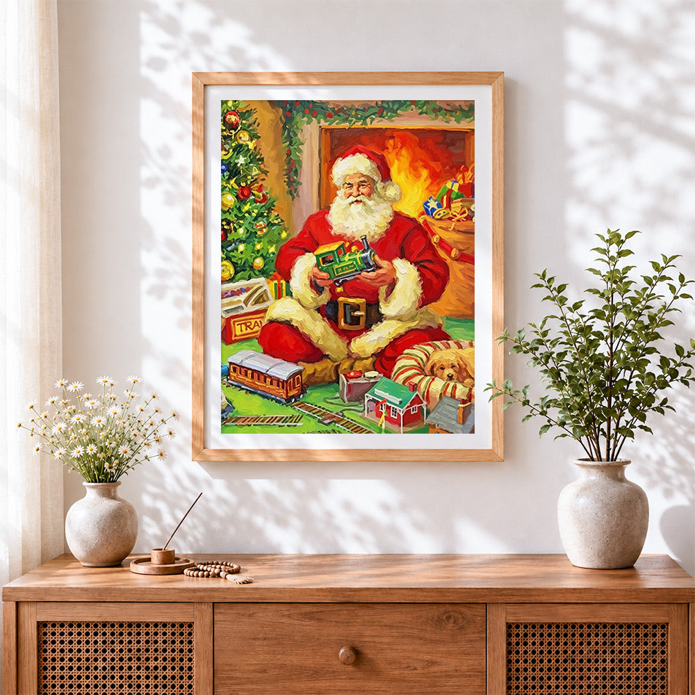 Finished father christmas playing with a toy train cross stitch artwork displayed