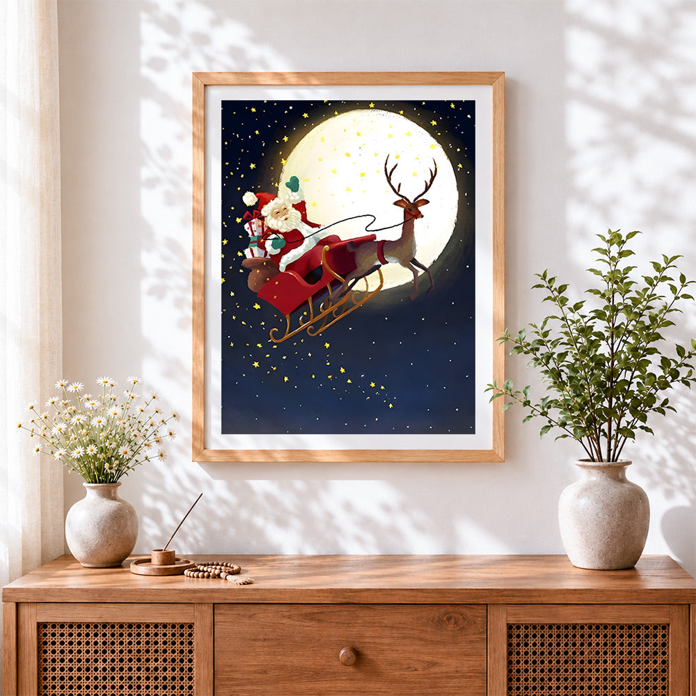 Finished father christmas sleigh ride over the moon cross stitch artwork displayed