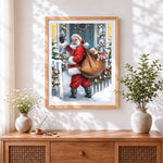 Finished father christmas waving with a sack of toys cross stitch artwork displayed