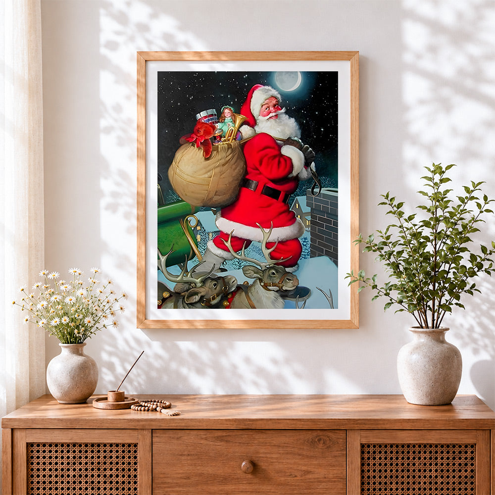 Finished father christmas with a sack of presents cross stitch artwork displayed