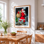 Father christmas with a sack of presents cross stitch artwork displayed on wall as home decor