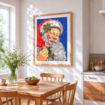 Father christmas with candy cane cross stitch artwork displayed on wall as home decor