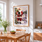 Father christmas with sack in a snowy village cross stitch artwork displayed on wall as home decor