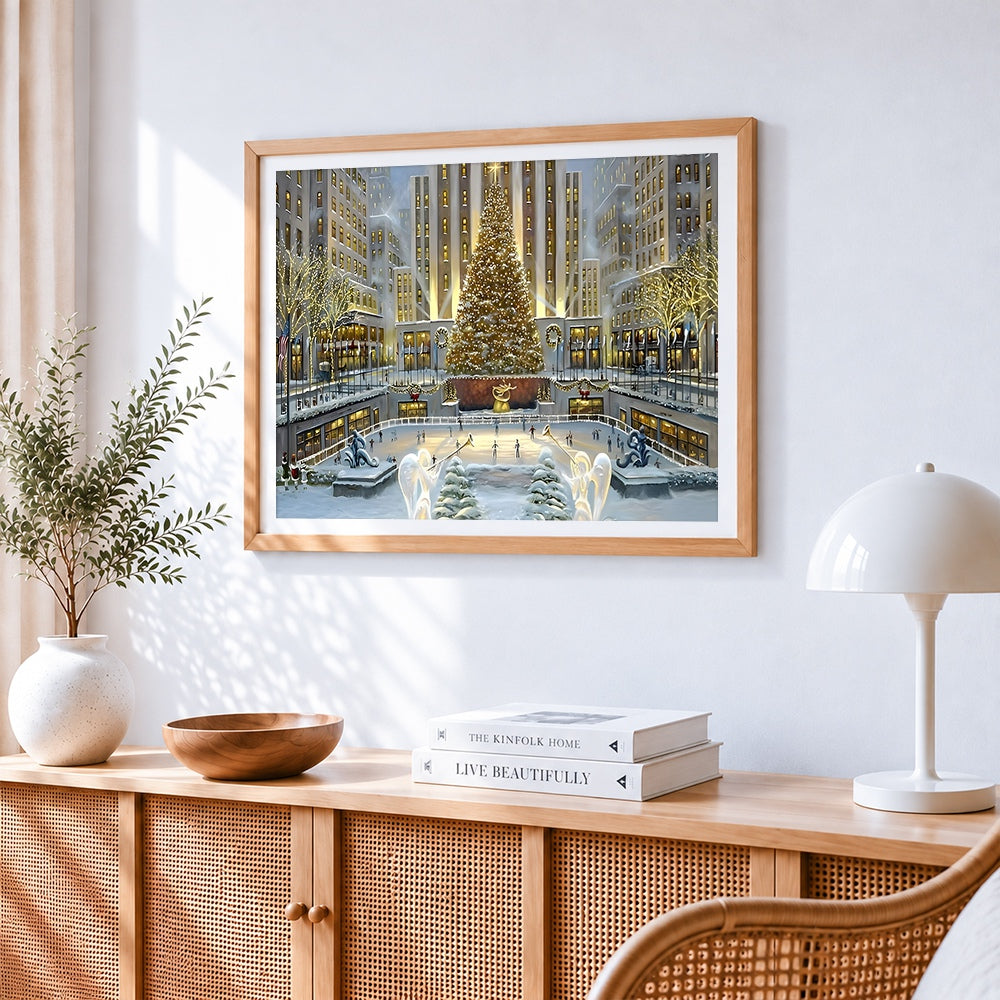 Festive city ice rink and giant christmas tree cross stitch artwork displayed on wall as home decor