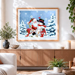 Finished festive father snowmen and robins cross stitch artwork displayed