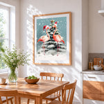 Festive flamingos in santa hats cross stitch artwork displayed on wall as home decor