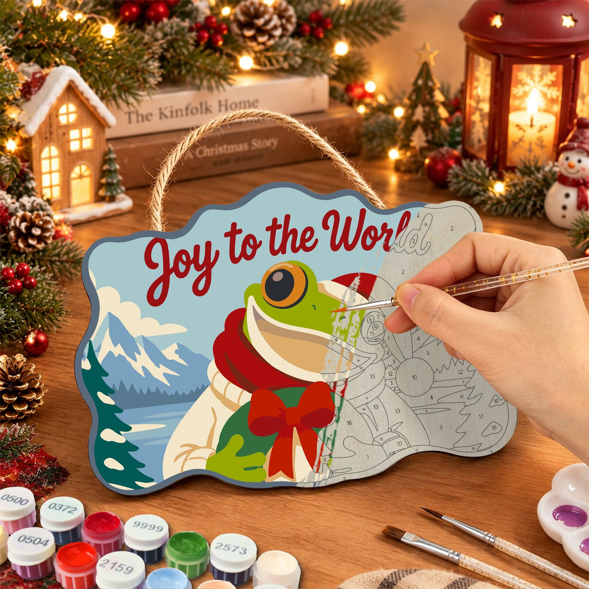Festive frog greeting paint by numbers door hanger painting process