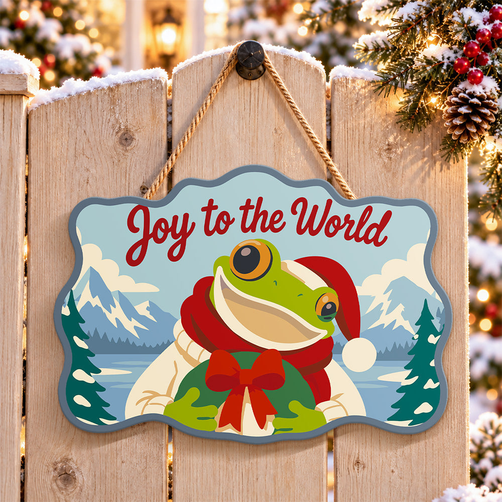Festive frog greeting paint by numbers door hanger on a garden gate