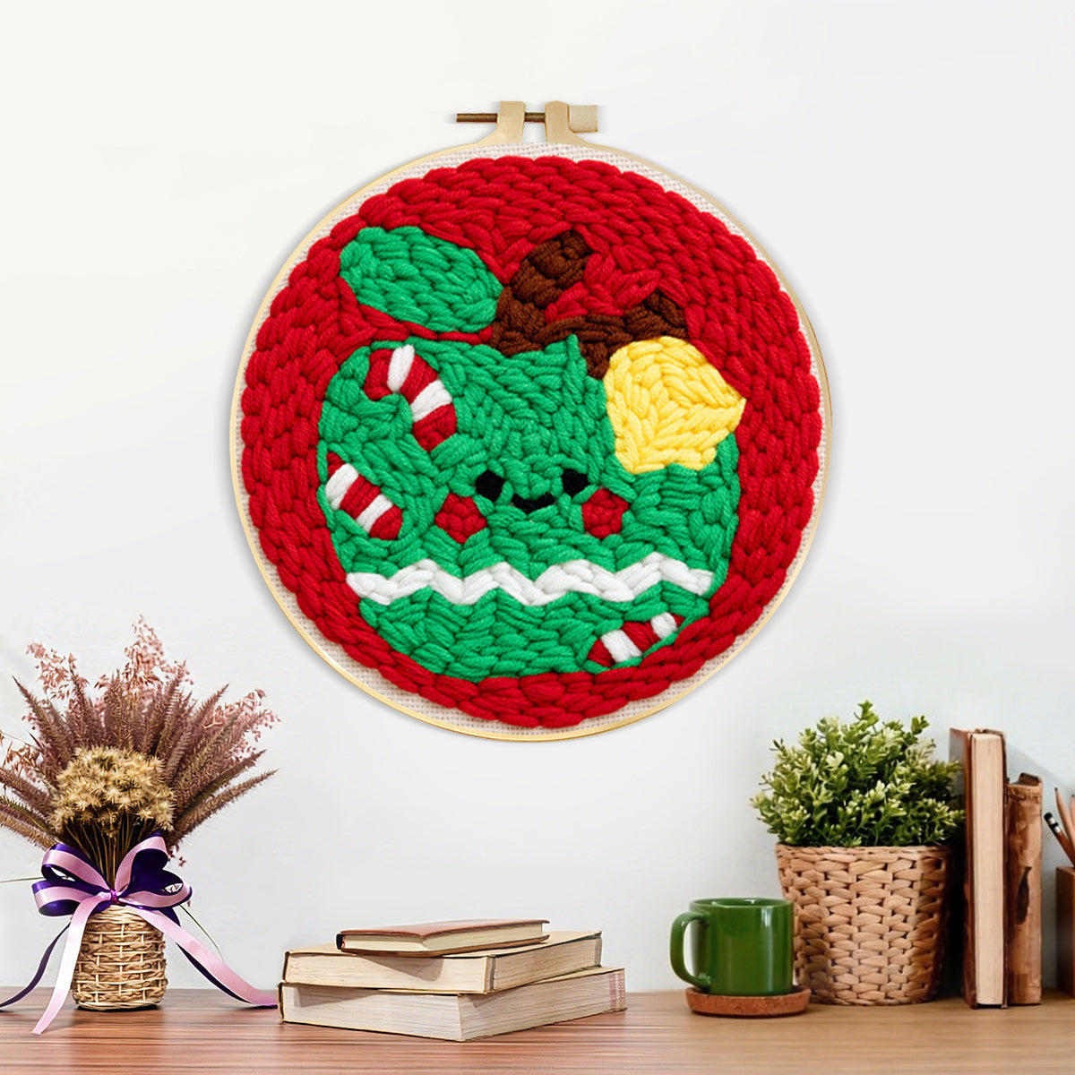 Finished festive green apple artwork displayed on a wall
