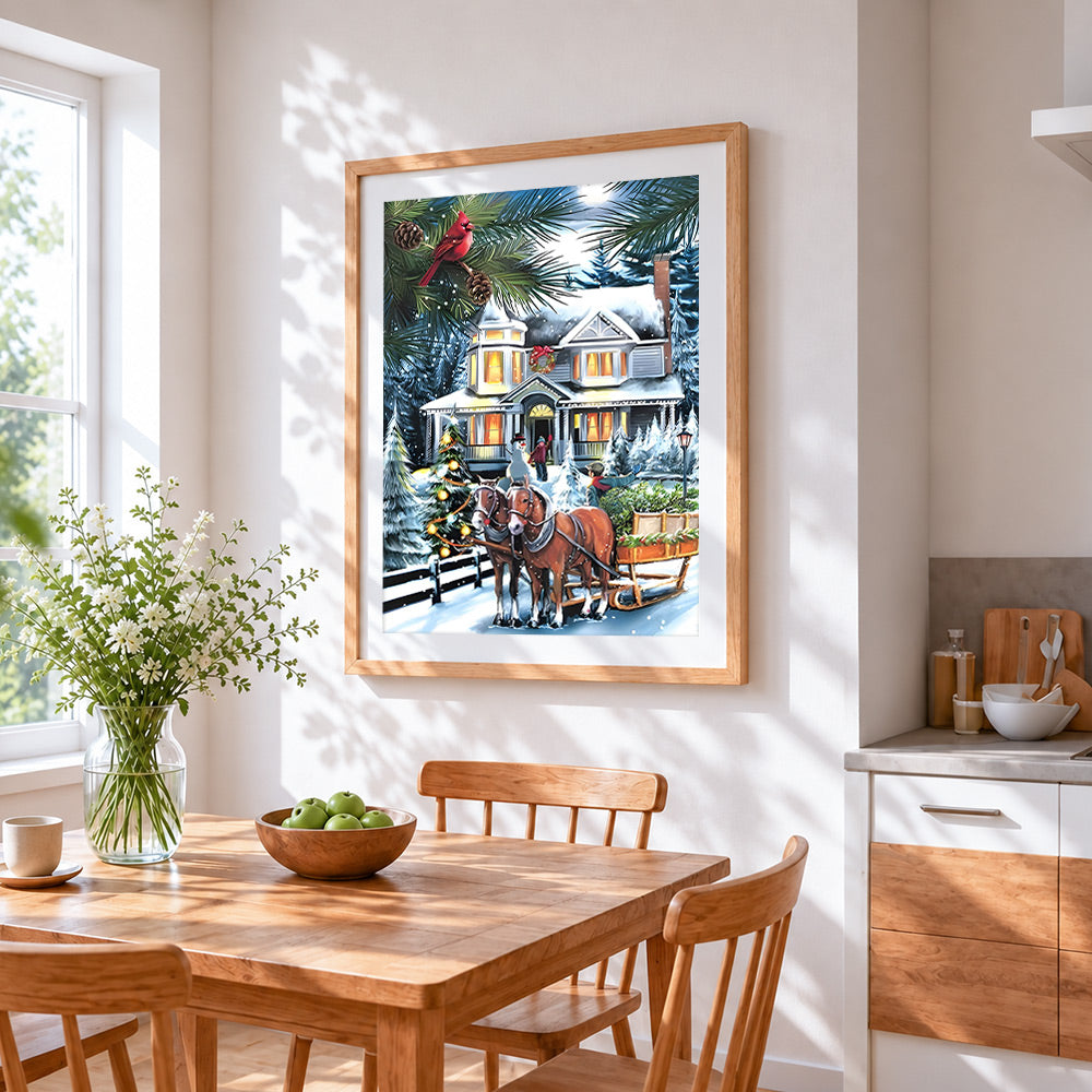 Festive horse-drawn sleigh by a snowy house cross stitch artwork displayed on wall as home decor