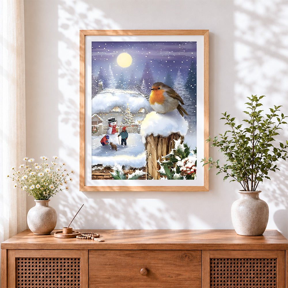 Finished festive robin and children playing in a snowy village cross stitch artwork displayed