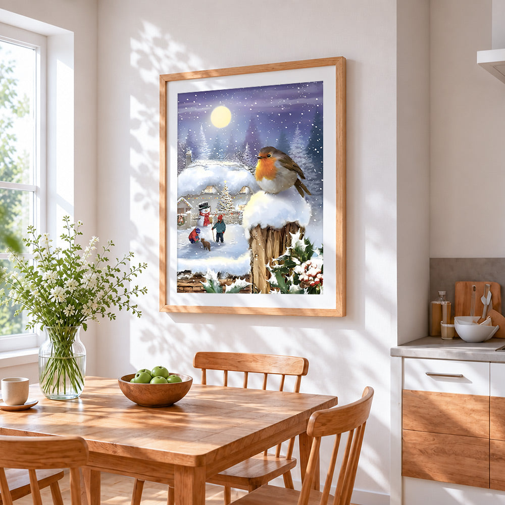 Festive robin and children playing in a snowy village cross stitch artwork displayed on wall as home decor