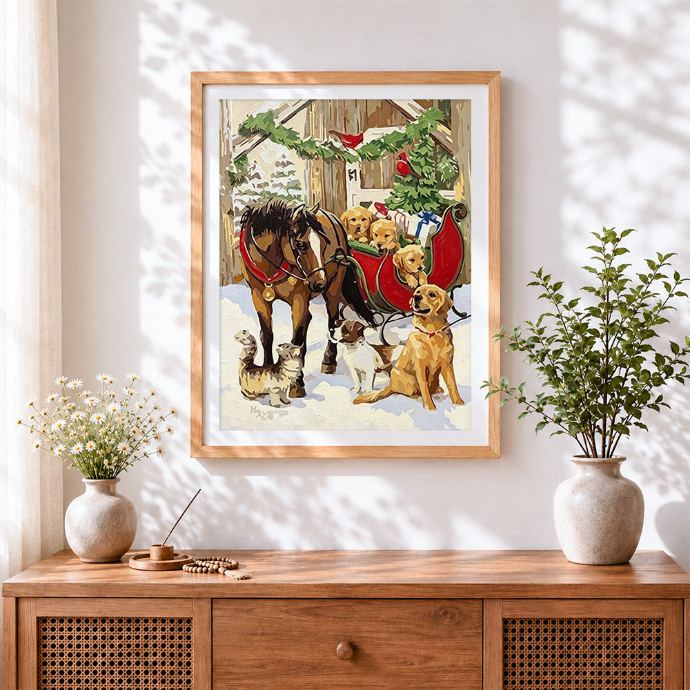 Finished festive sleigh full of golden puppies cross stitch artwork displayed