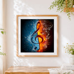 Finished fire and ice music note cross stitch artwork displayed