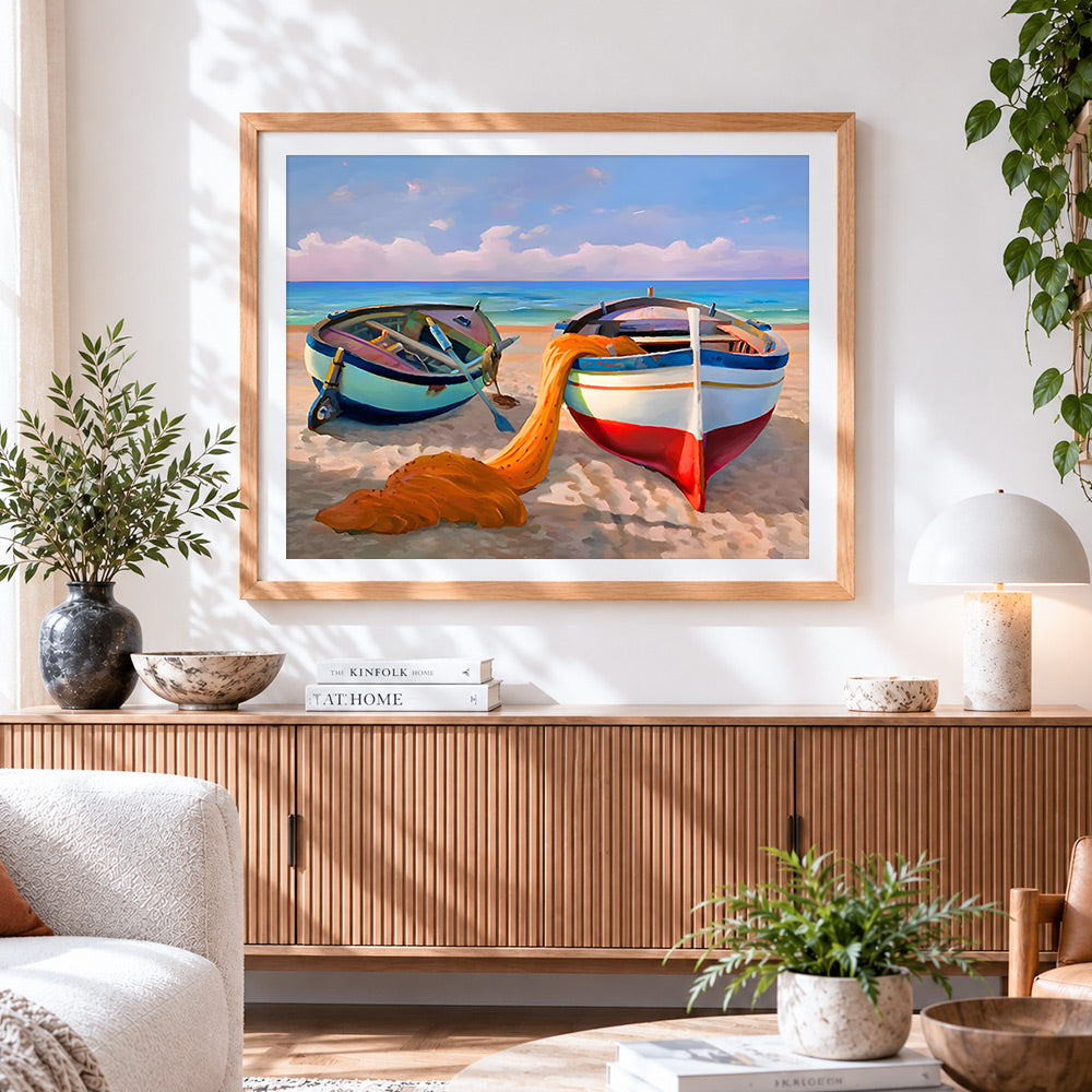 Finished fishing boats on the beach cross stitch artwork displayed