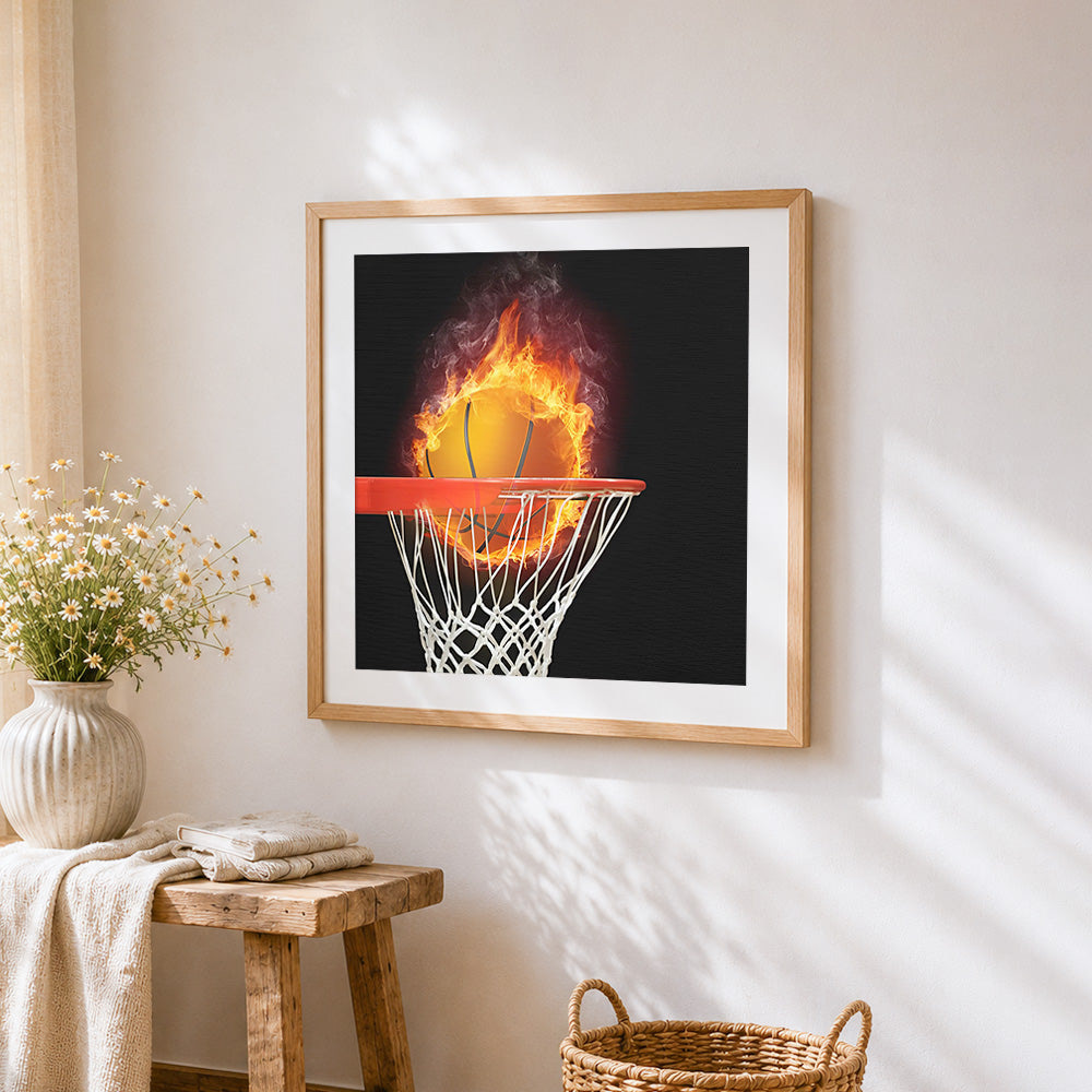Flaming basketball hoop cross stitch artwork displayed on wall as home decor