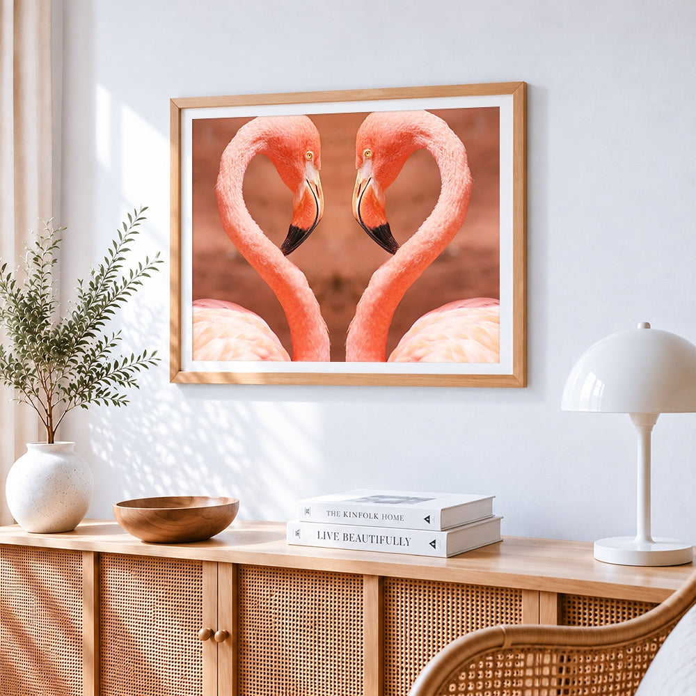 Flamingos forming a heart paint by numbers artwork displayed on wall as home decor