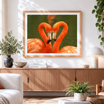Finished flamingos heart on green water cross stitch artwork displayed