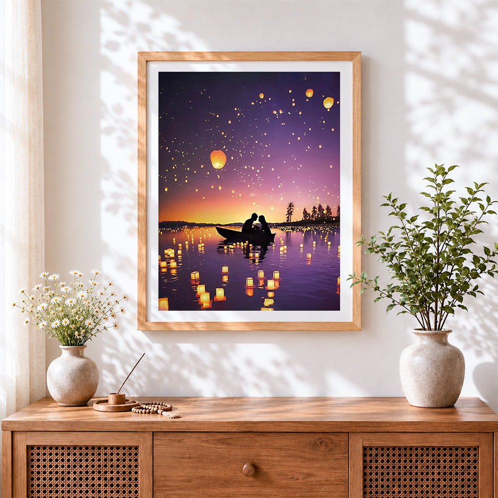Finished floating lanterns and couple cross stitch artwork displayed