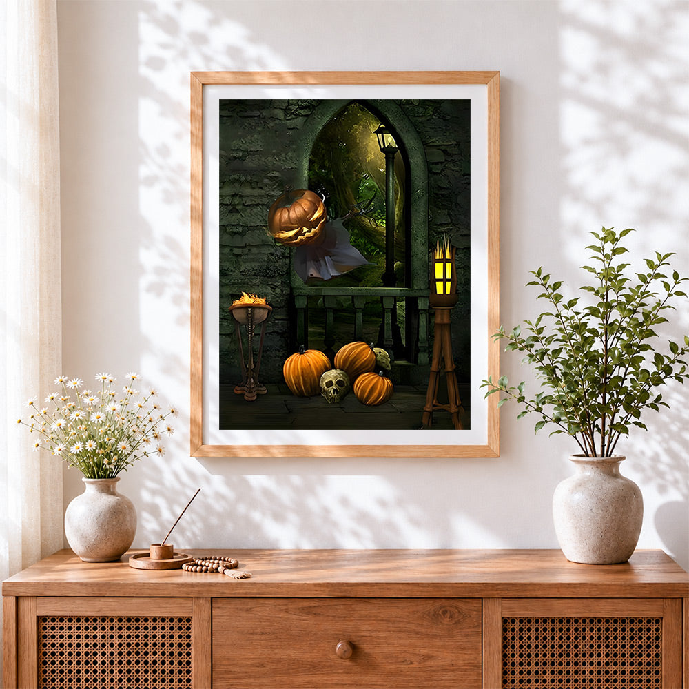 Finished floating pumpkin ghost in gothic arch cross stitch artwork displayed