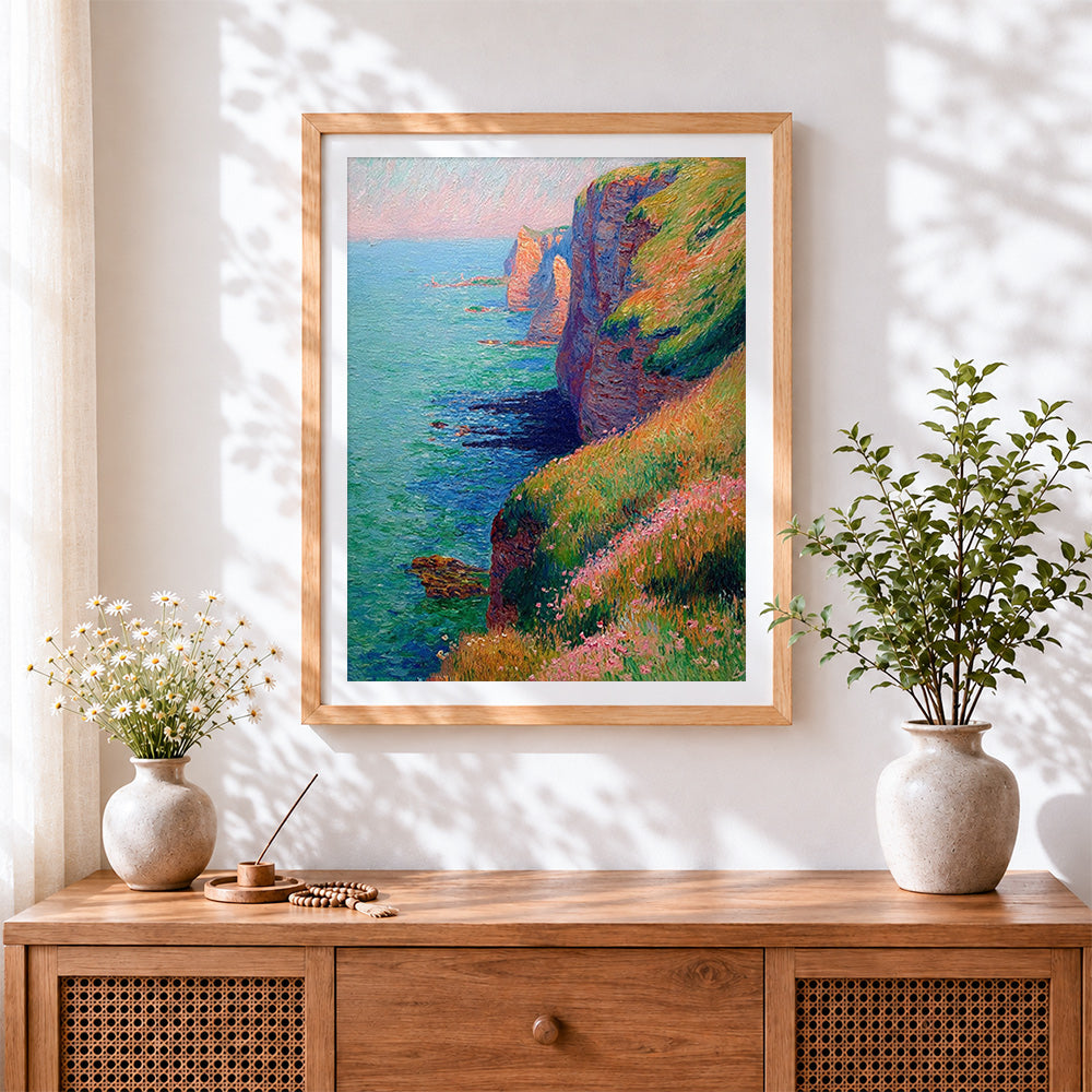 Finished floral coastal cliffs cross stitch artwork displayed