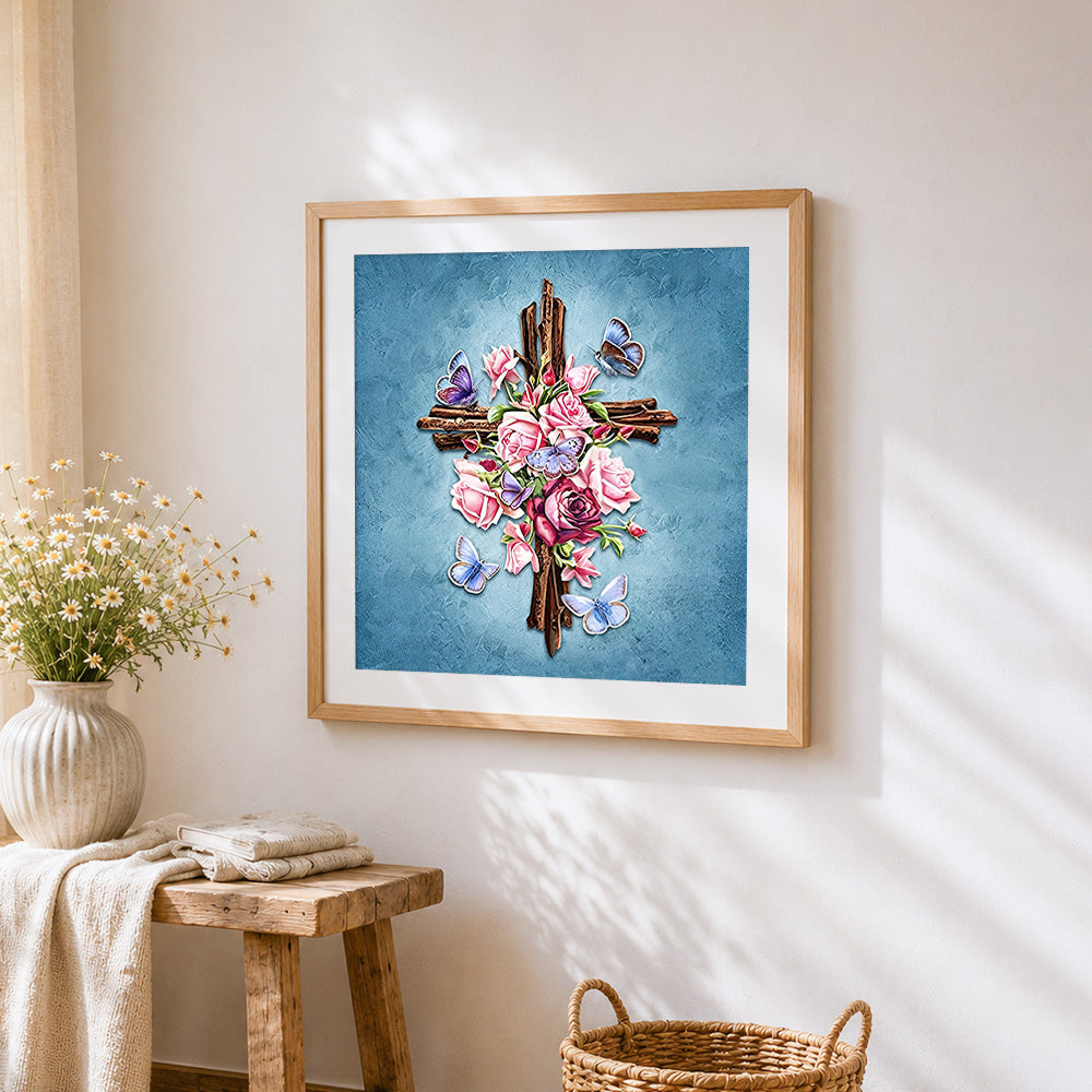 Floral cross with butterflies cross stitch artwork displayed on wall as home decor