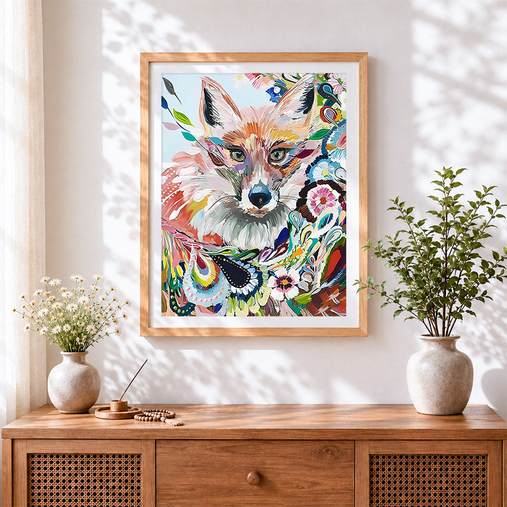 Finished floral fox cross stitch artwork displayed