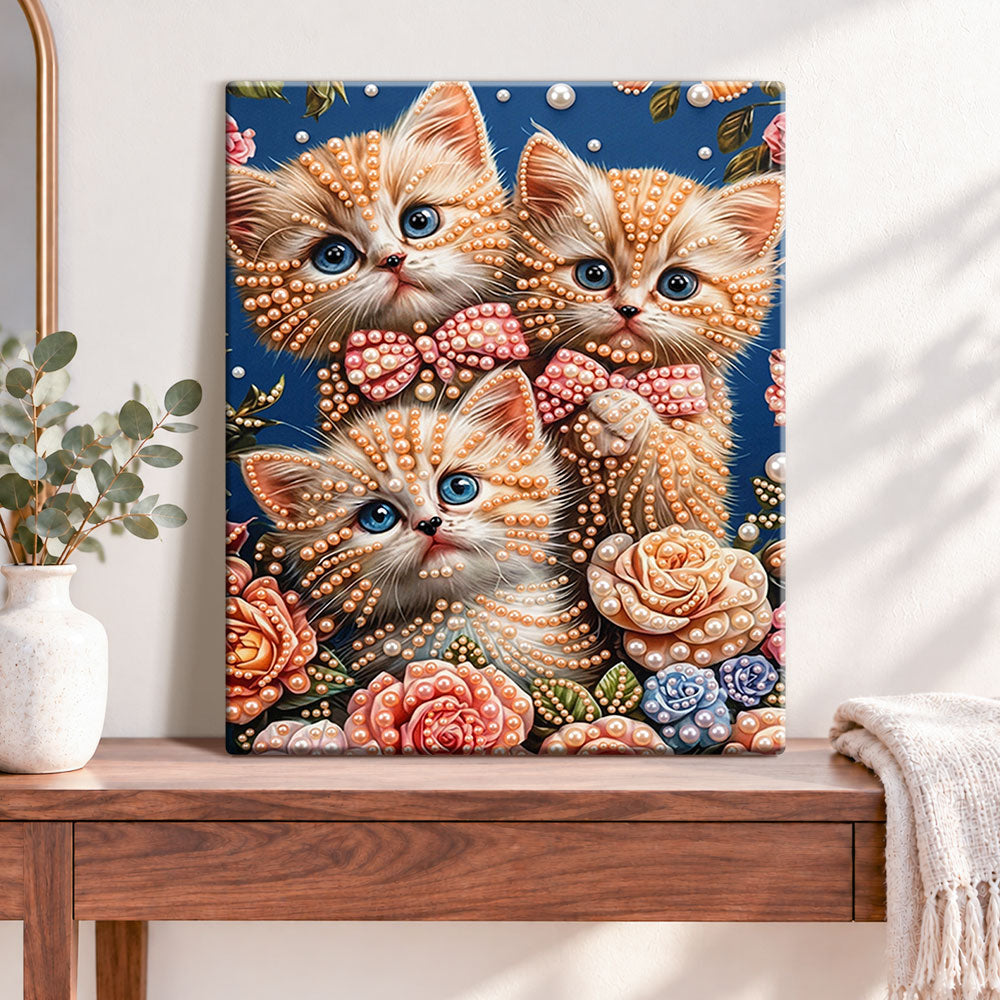 Finished floral kitten trio pearl diamond painting artwork displayed as home decor