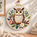 Floral owl on branch embroidery hoop wall art displayed as warm and cosy handmade home decor