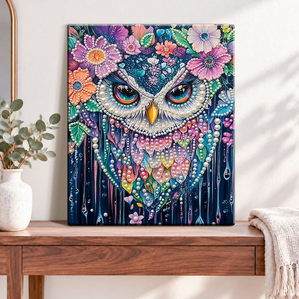 Finished floral owl splendor pearl diamond painting artwork displayed as home decor
