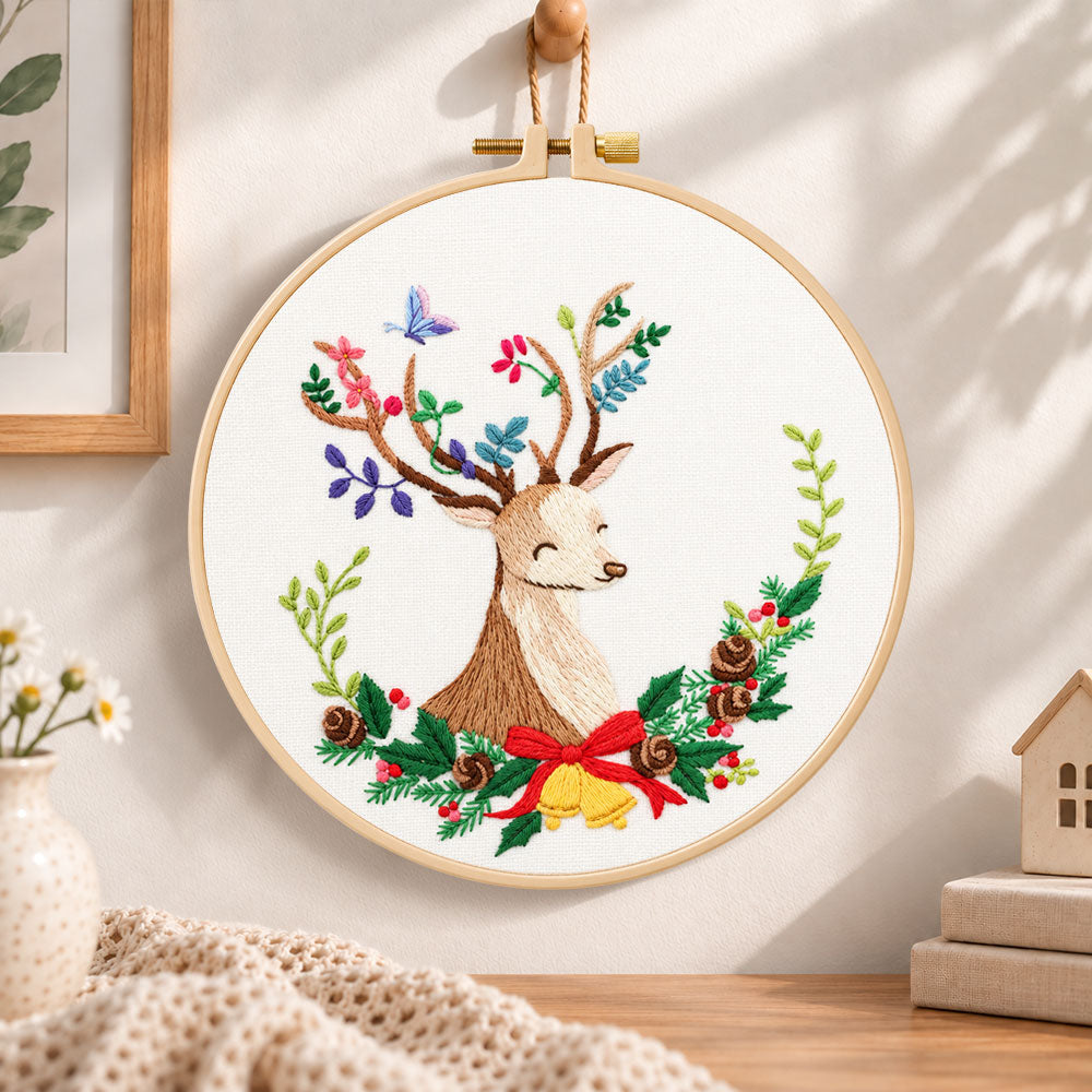 Floral reindeer art embroidery hoop wall art displayed as warm and cosy handmade home decor