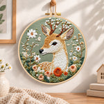 Floral sika deer embroidery hoop wall art displayed as warm and cosy handmade home decor