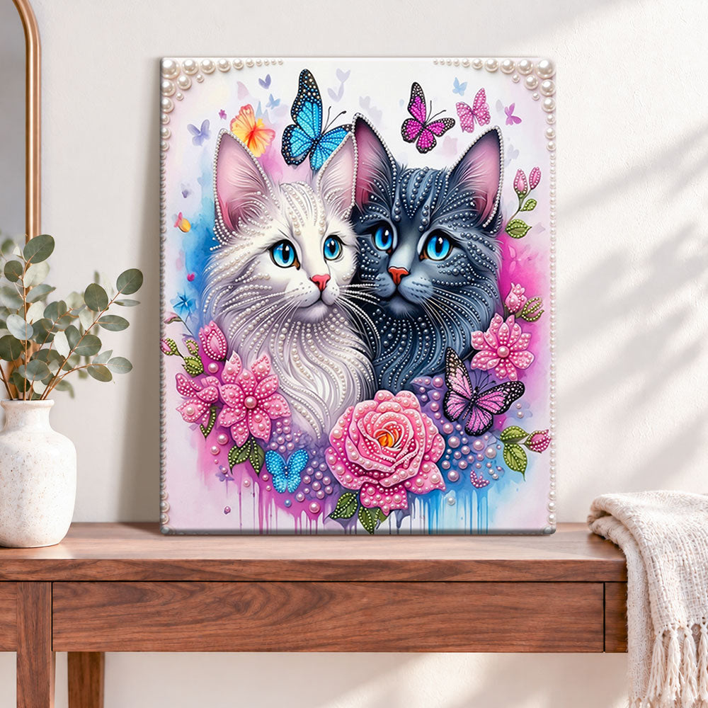 Finished floral twin cats pearl diamond painting artwork displayed as home decor