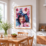 Floral woman with bluebird cross stitch artwork displayed on wall as home decor