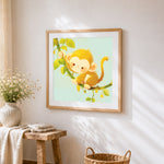 Fluffy baby monkey on a branch cross stitch artwork displayed on wall as home decor