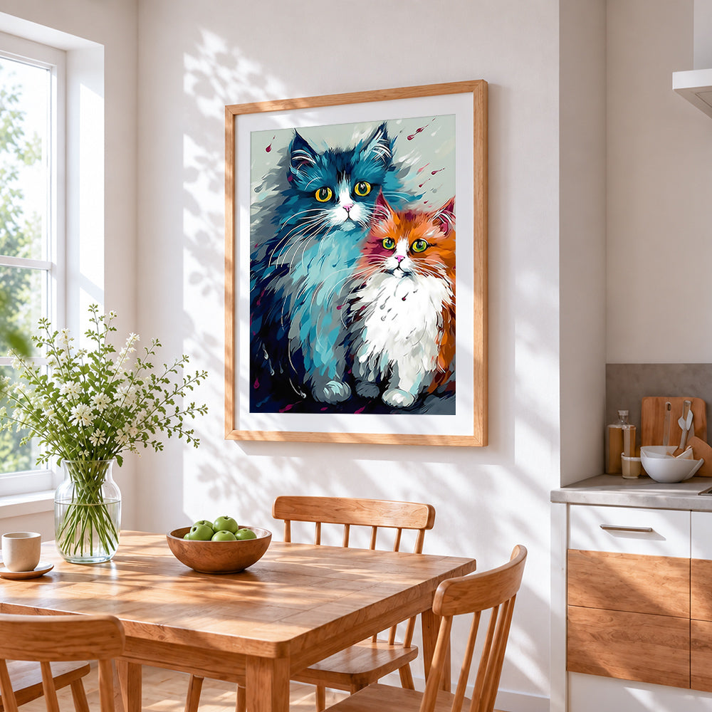 Fluffy blue and orange cats cross stitch artwork displayed on wall as home decor