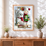 Finished fluffy cat and snowman with hot chocolate cross stitch artwork displayed