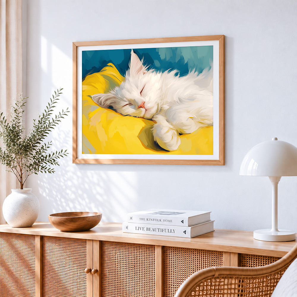 Fluffy white cat sleeping on a yellow pillow paint by numbers artwork displayed on wall as home decor