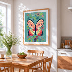 Folk art butterfly and flowers cross stitch artwork displayed on wall as home decor