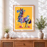 Finished folk art colourful zebra cross stitch artwork displayed