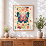 Finished folk art floral butterfly pattern cross stitch artwork displayed