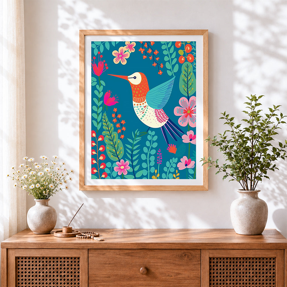 Finished folk art hummingbird and floral pattern cross stitch artwork displayed